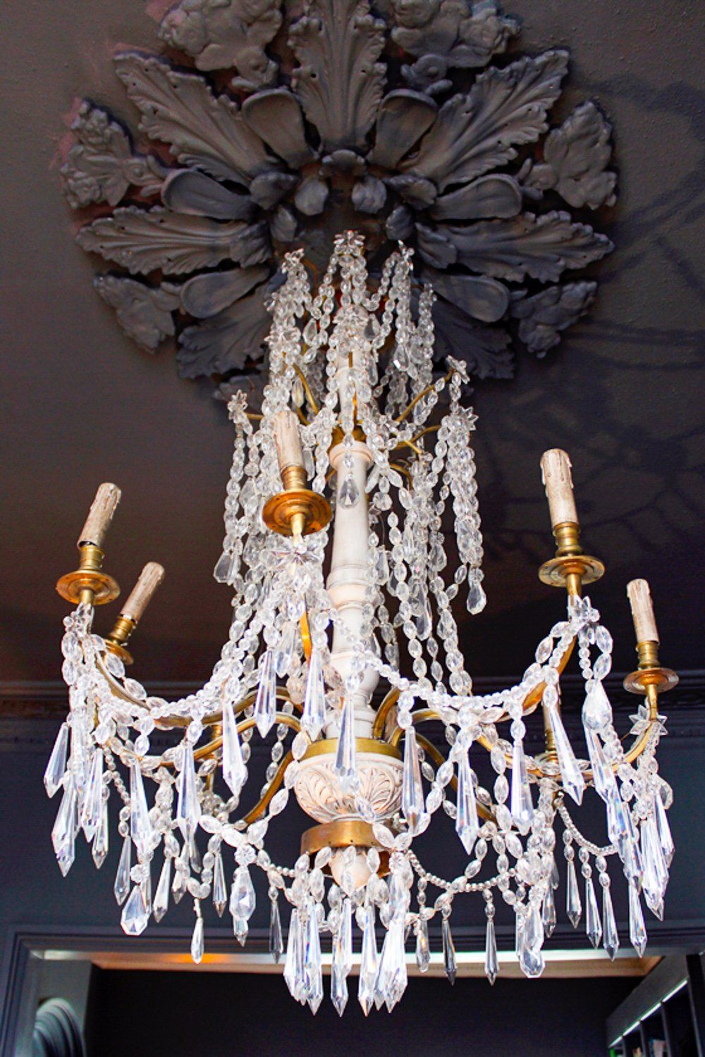 Chandelier with dark ceiling at Abigail Ahern